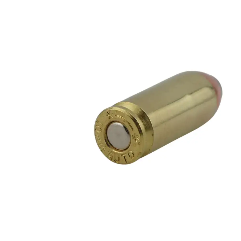 Brass cartridge shell with visible primer at the base, photographed at an angle