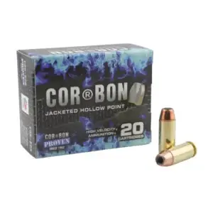 Box of Cor-Bon jacketed hollow point ammunition with two loose cartridges beside it, blue and black packaging visible.