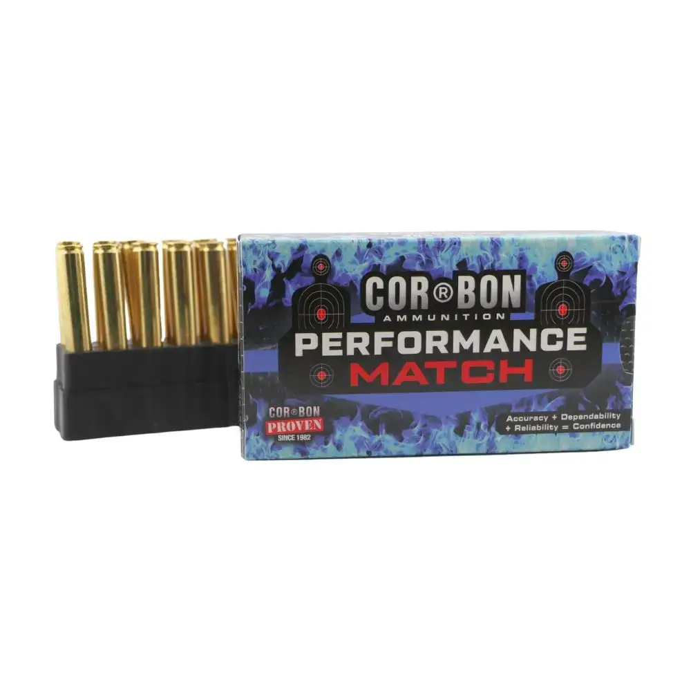 Box of Cor-Bon Performance Match ammunition with several brass cartridges visible inside a black holder on the left.