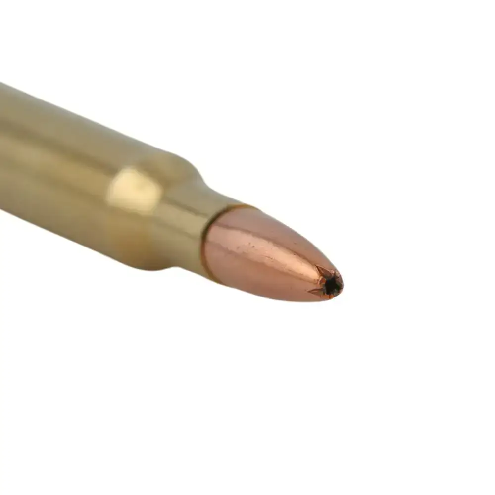 Copper-jacketed bullet tip isolated on a white background