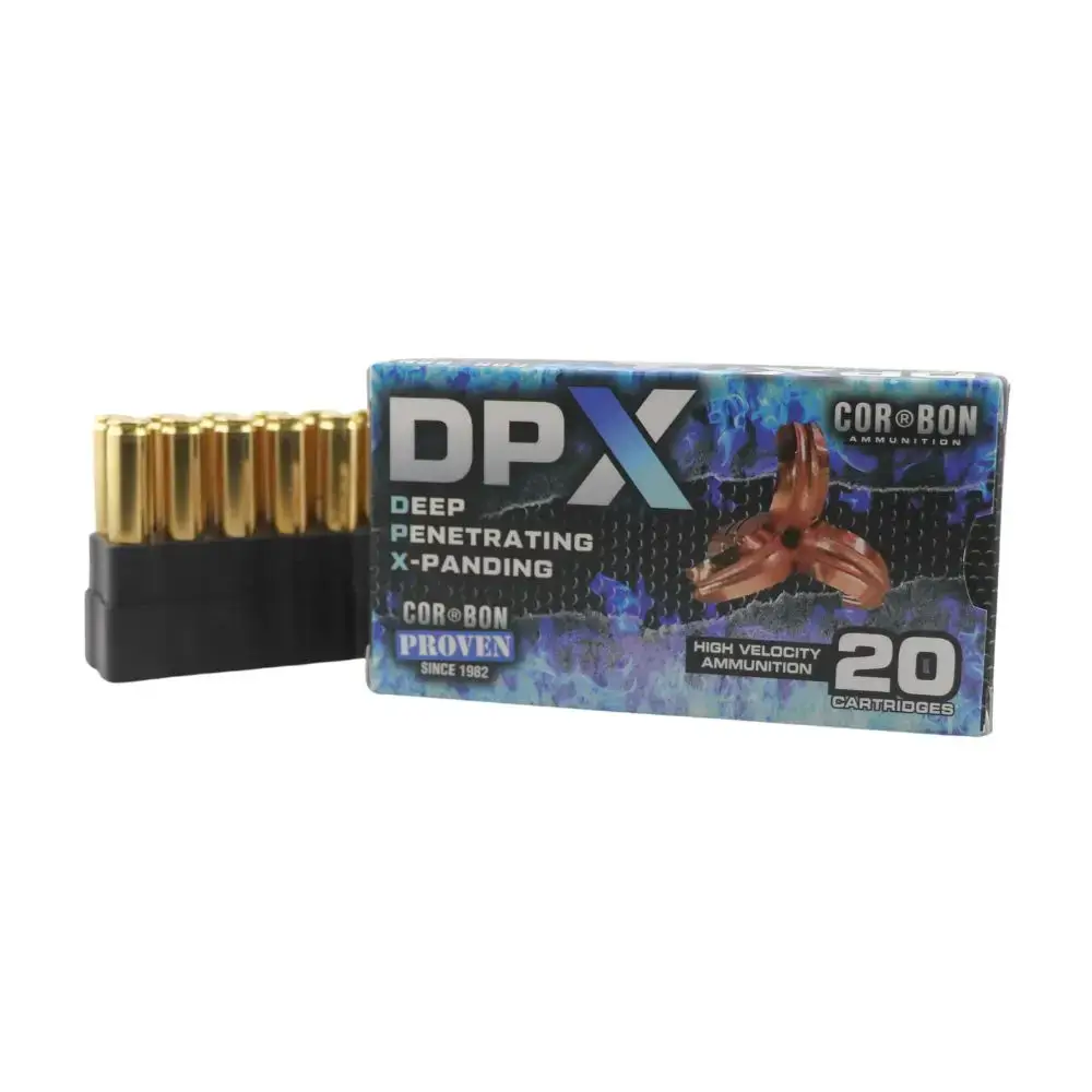 Box of 20 DPX high-velocity ammunition cartridges in a blue designed package, with a row of gold bullets visible in a black plastic carrier on the left side.