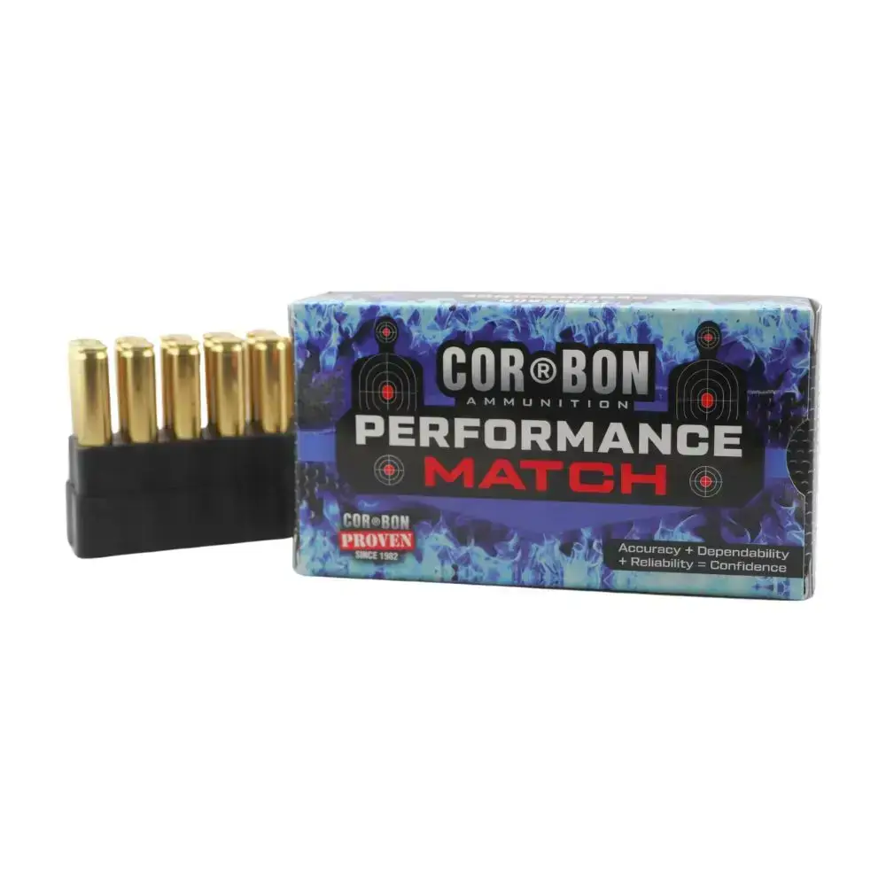 Box of COR-BON Performance Match ammunition with seven brass cartridges visible in a black holder.