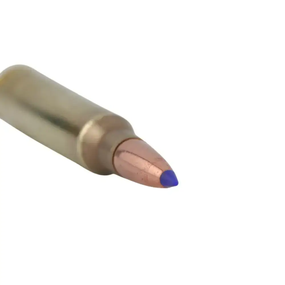 Close-up of a copper bullet with a blue tip against a white background.