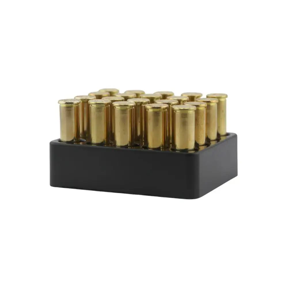 Black plastic holder filled with rows of brass rifle cartridges.