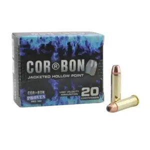 Box of CORBON jacketed hollow point ammunition, 20 cartridges, with two bullets lying beside it