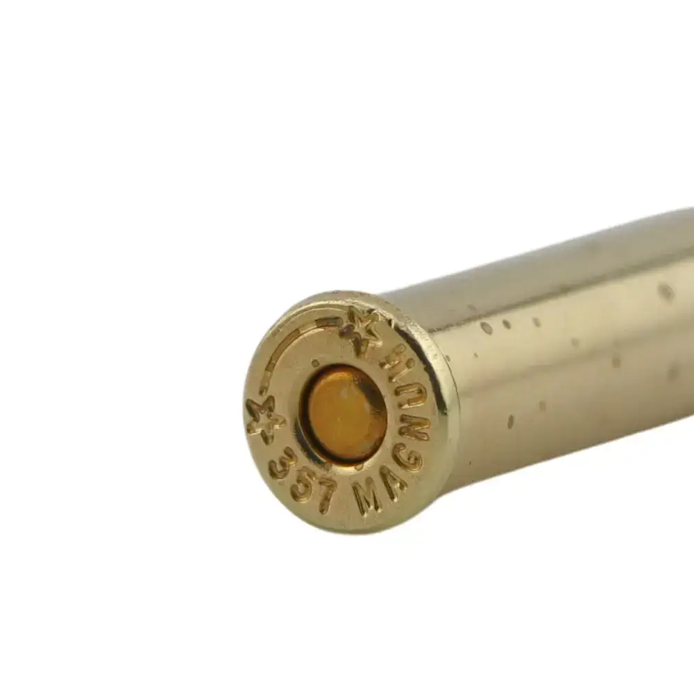 Close-up of a brass ammunition cartridge base with the primer visible
