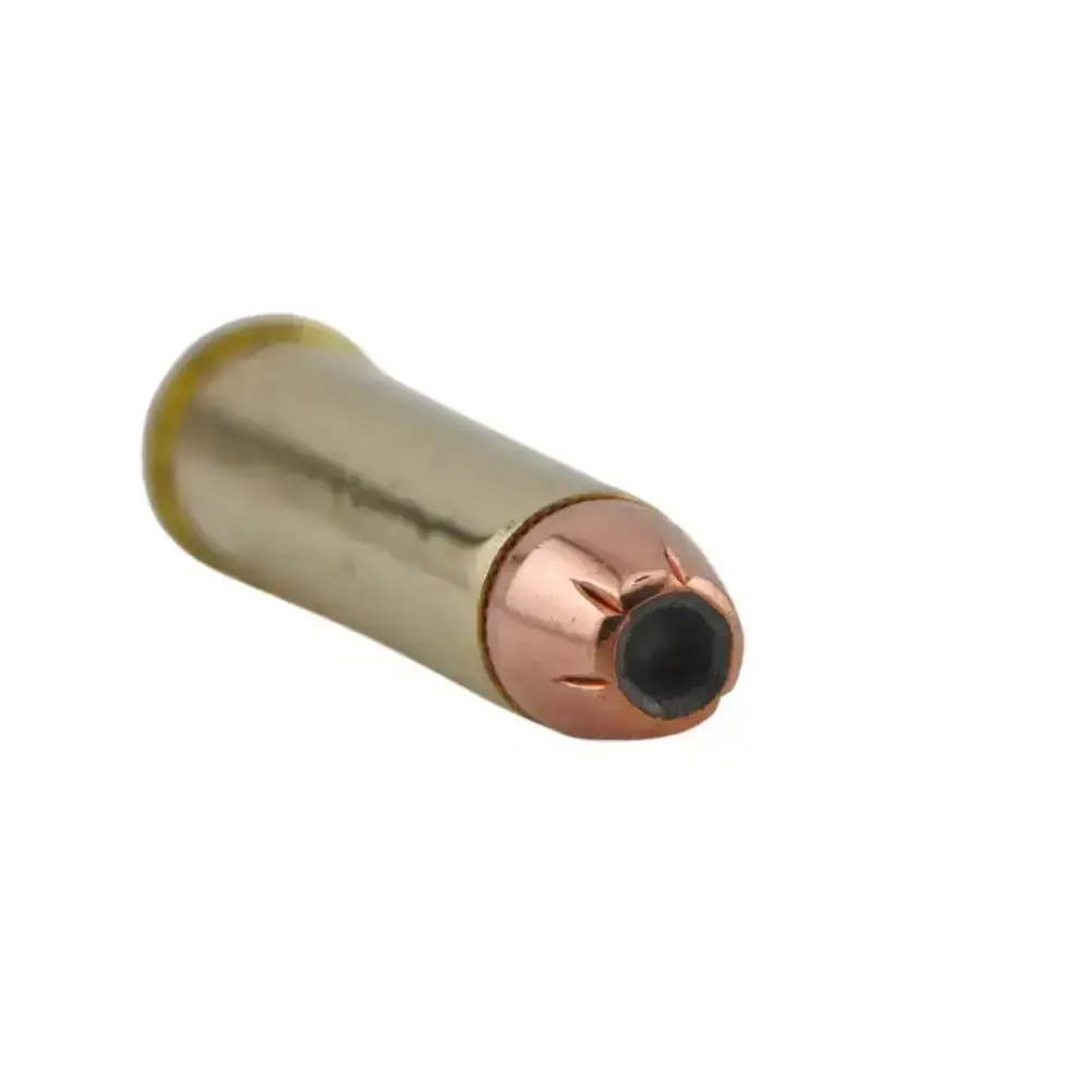 Single brass ammunition cartridge with a copper-jacketed bullet, viewed from the side.