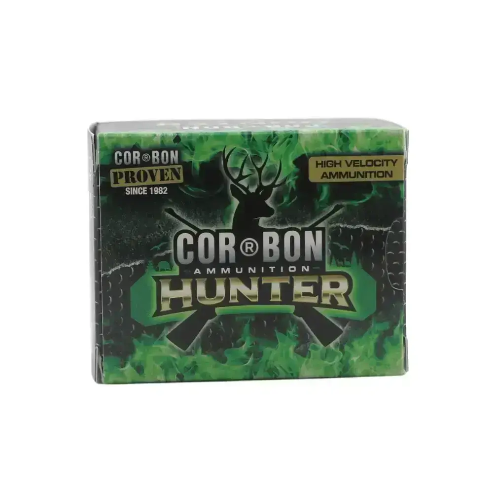 Cor-Bon Hunter ammunition box with green and black flames and a deer silhouette on the front