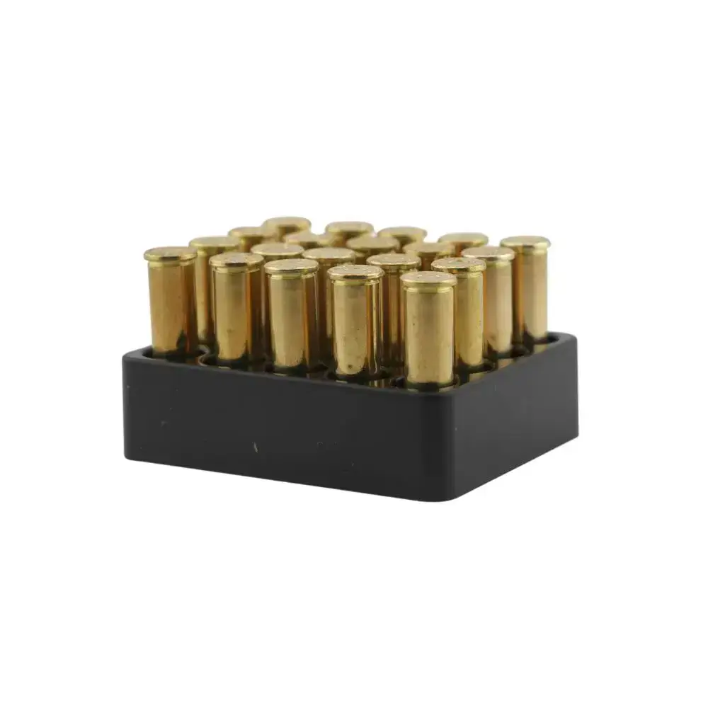 Row of brass firearm cartridges standing upright in a small black plastic rack