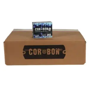 Large brown cardboard box with a black COR-BON label; a small blue-black ammunition box sits on top (20 cartridges).
