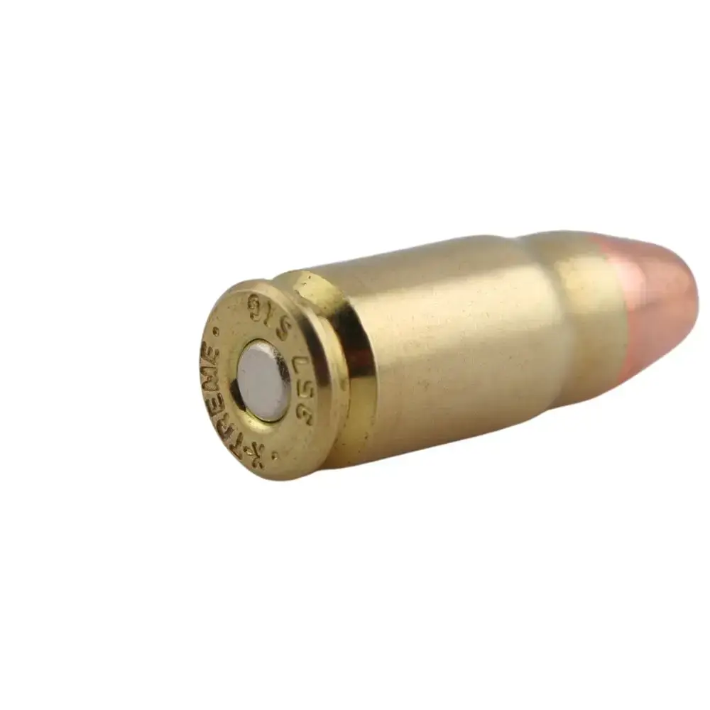Single brass ammunition cartridge with copper bullet, lying on its side.
