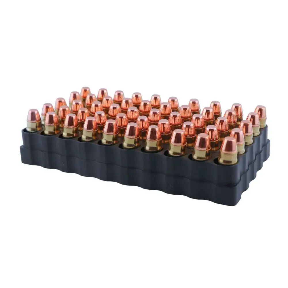 Tray of copper-jacketed ammunition cartridges arranged in a black plastic rack