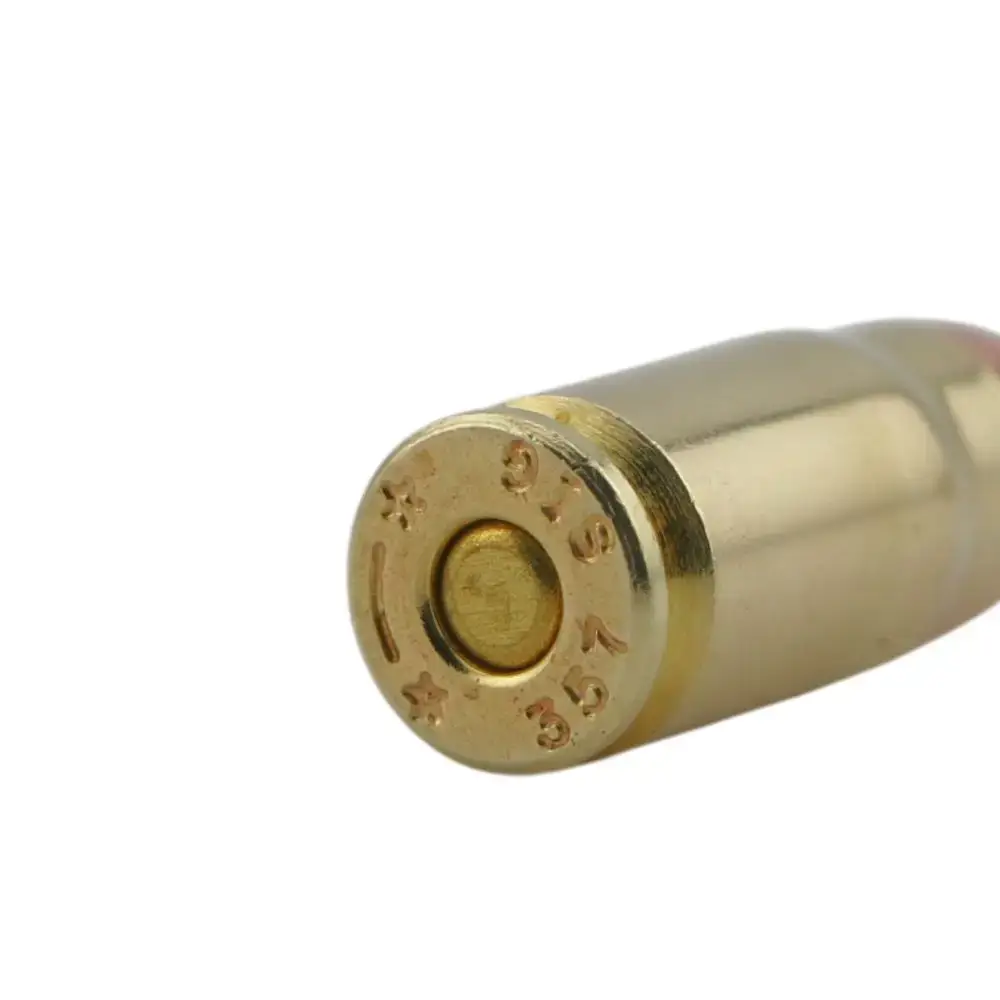 Close-up of a brass ammunition cartridge base with a central primer on a white background