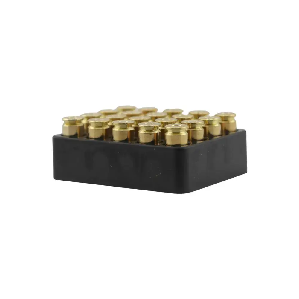 Black rectangular plastic block with a grid of small gold-plated studs on top (electrical terminal-looking component).