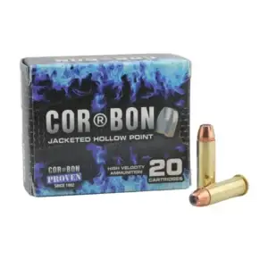 Box of COR-BON jacketed hollow point ammunition with two loose cartridges beside it