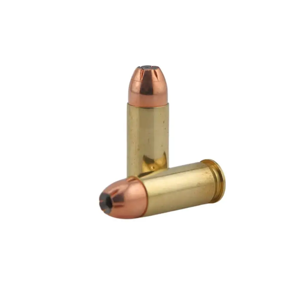 Two brass cartridges with copper jacketed bullets standing and leaning against each other, photographed against a white background.
