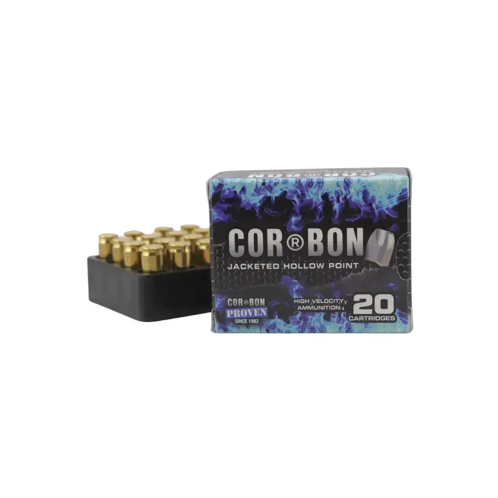 Box of Cor-Bon jacketed hollow point ammunition with 20 cartridges shown beside the box, brass casings visible in tray