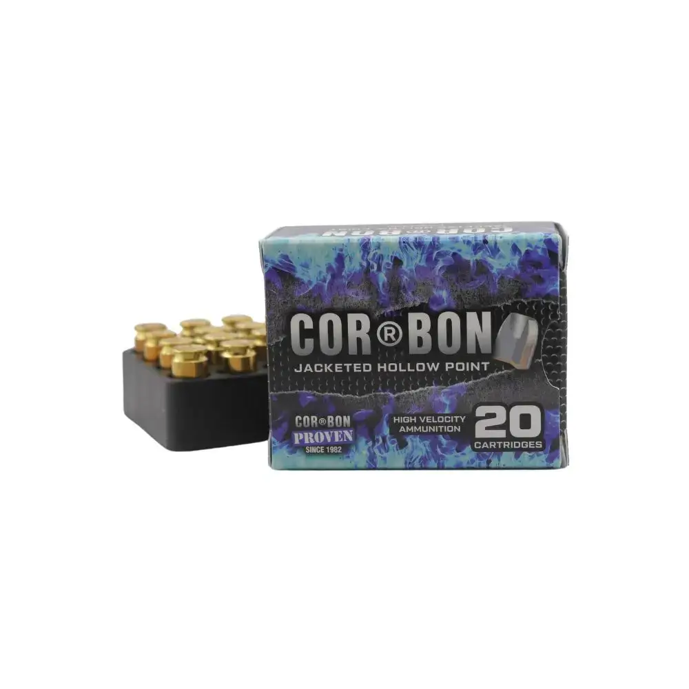 Cor-Bon 20-cartridge box of high-velocity ammunition with loose rounds in a black plastic tray beside it, Jacketed Hollow Point.