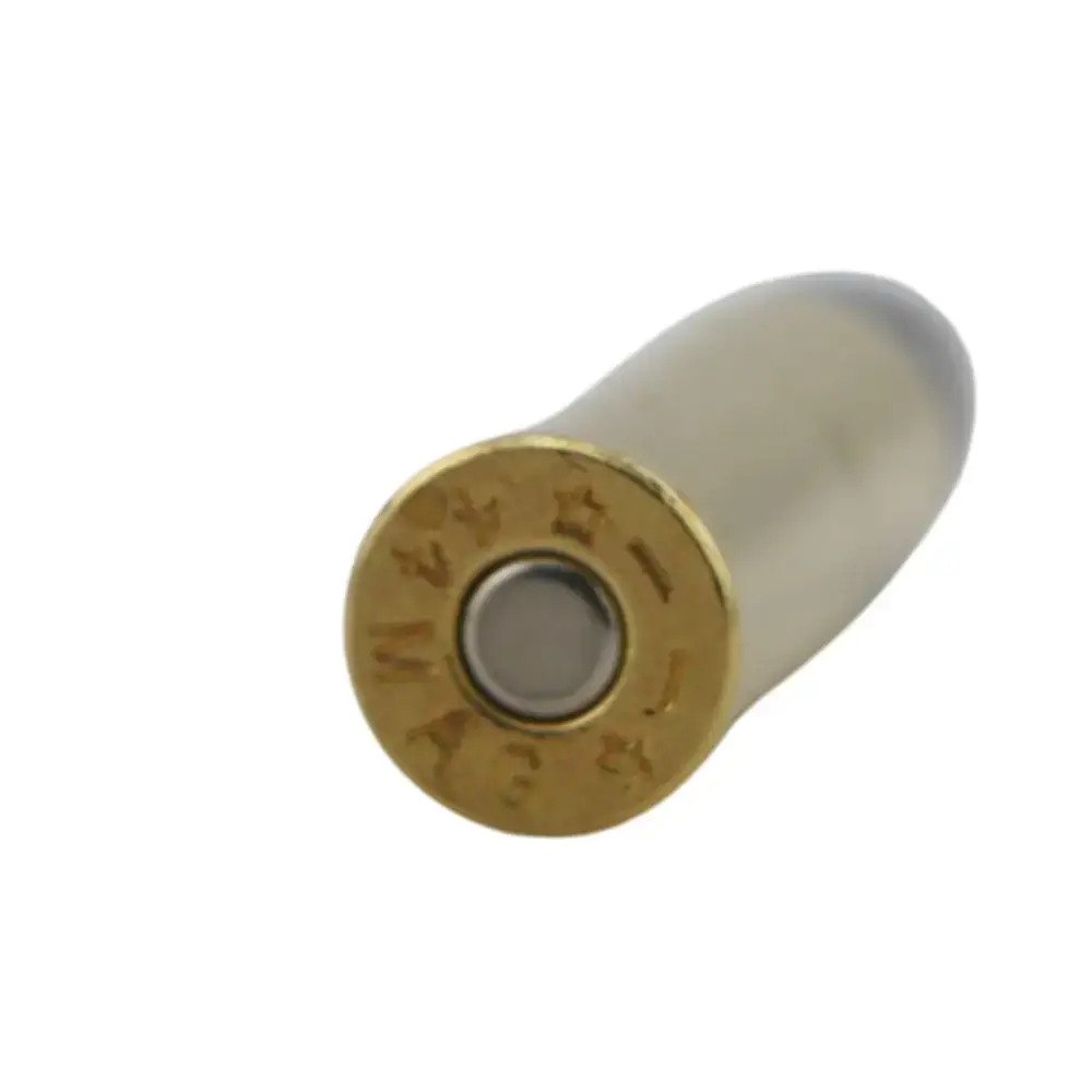 Close-up of a spent brass cartridge head with a round primer.