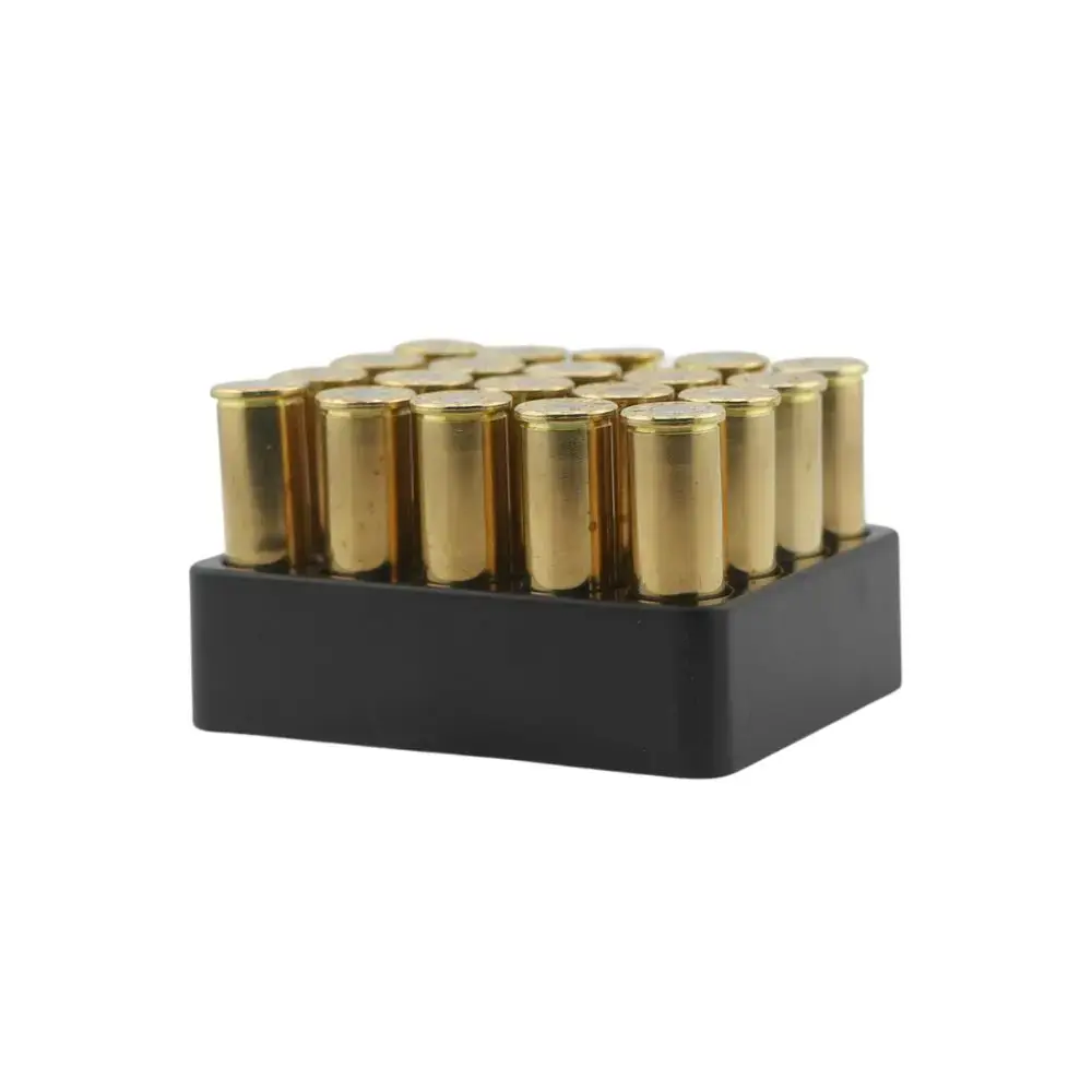 Row of brass shotgun shells in a black plastic holder.