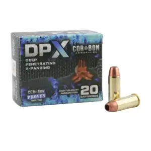 Box of DPX Cor-Bon ammunition, 20 cartridges, with two copper-jacketed bullets beside it