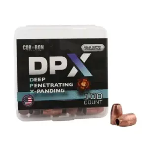 Box of Cor-Bon DPX copper bullets for ammunition, labeled Deep Penetrating X-Panding, 100 count with two bullets beside the container