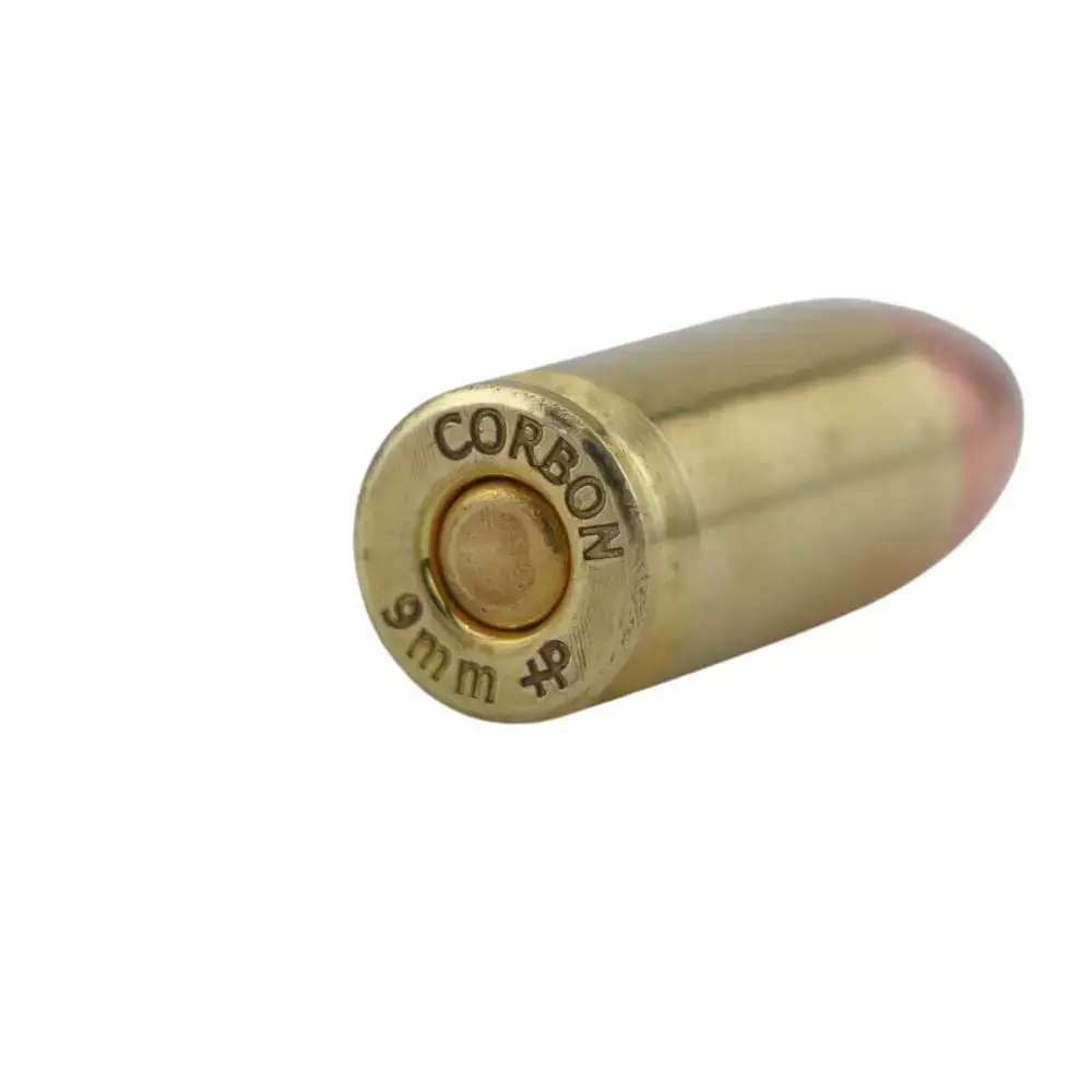 Brass 9mm cartridge casing viewed from the side with the base facing outward, showing the CORBON branding and mouth of the shell