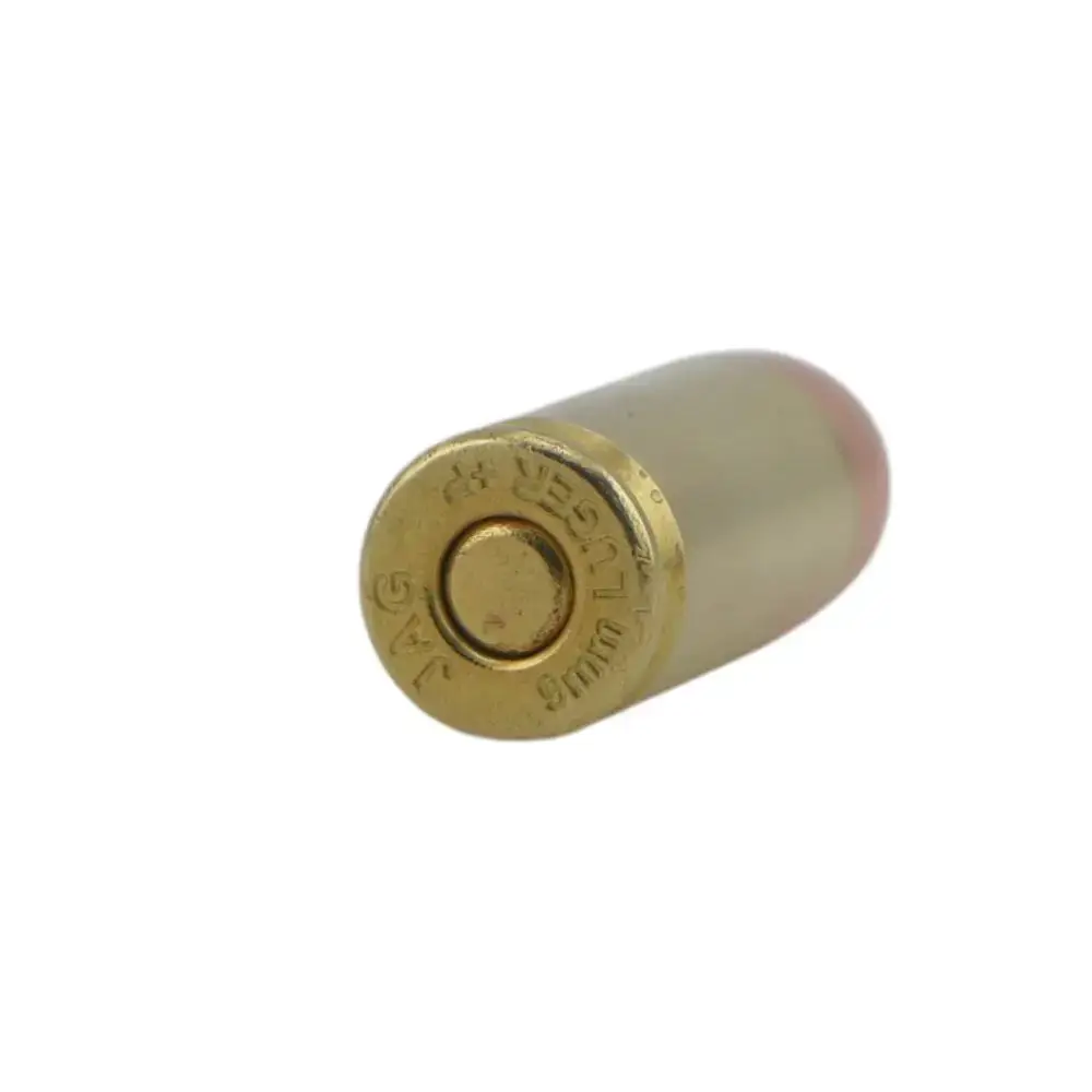 Spent brass cartridge casing with primer end facing the viewer