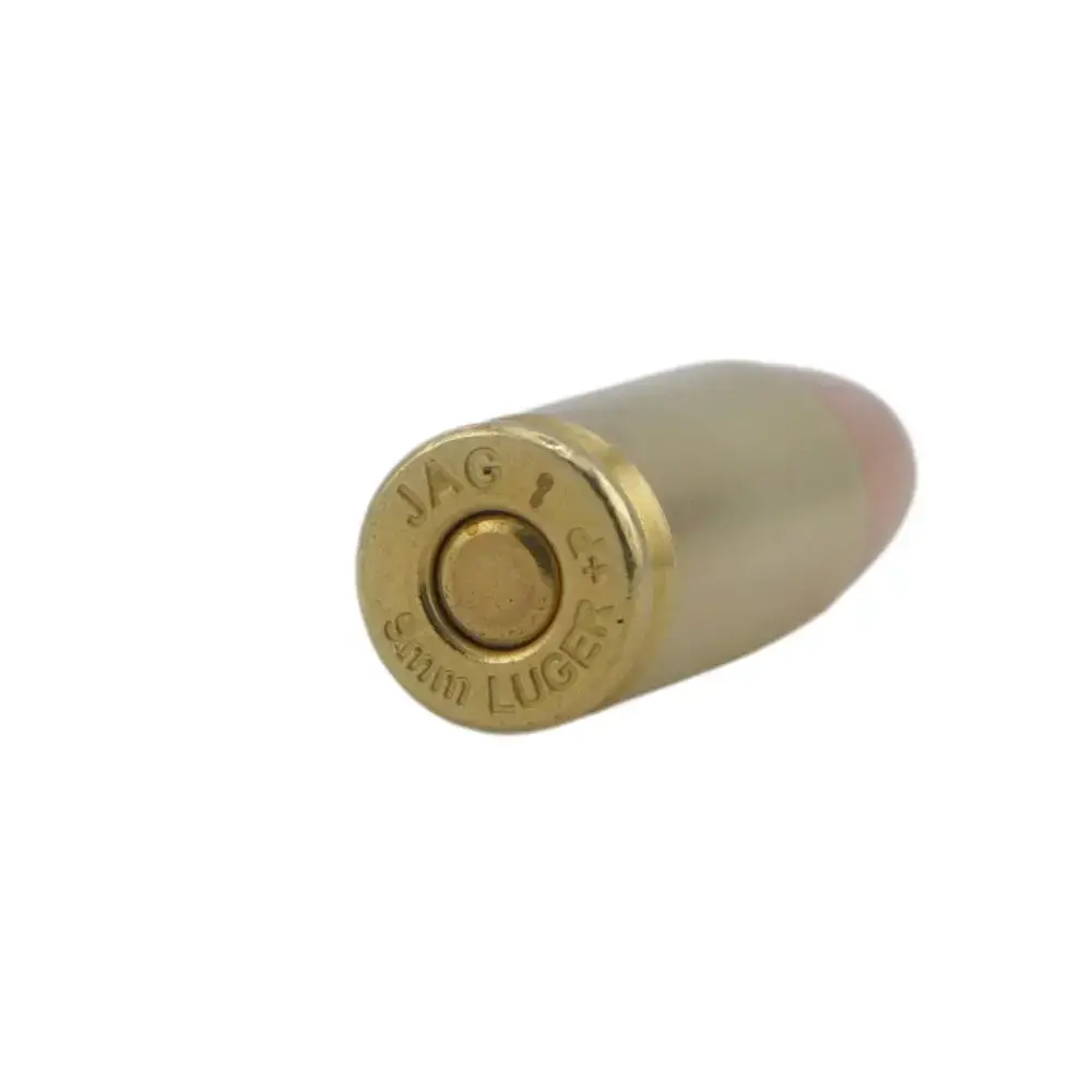 Close-up of a brass ammunition cartridge base with primer on a white background.