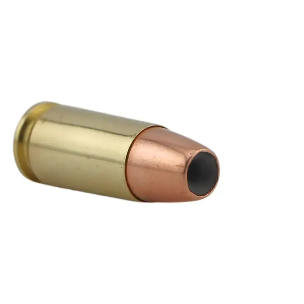 Brass cartridge case with a copper-colored bullet seated at the end, shown in close-up